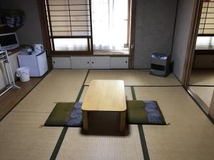 Posedenie v ubytovaní Minshuku Takenoya