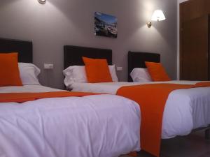 
Cama o camas de una habitación en Hotel Perú by Bossh Hotels
