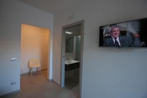 TV a/nebo společenská místnost v ubytování Avantgarde Hotel