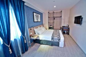 Postel nebo postele na pokoji v ubytování Diamond Inn