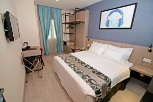 TV a/nebo společenská místnost v ubytování Diamond Inn
