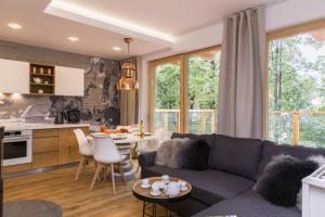 Kuchyňa alebo kuchynka v ubytovaní Apartamenty Pod Giewontem