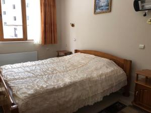 Katil atau katil-katil dalam bilik di Apt ECE PAMPOROVO