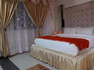 Ένα ή περισσότερα κρεβάτια σε δωμάτιο στο Setrac Orange