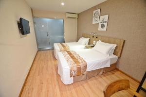 Postel nebo postele na pokoji v ubytování Diamond Inn