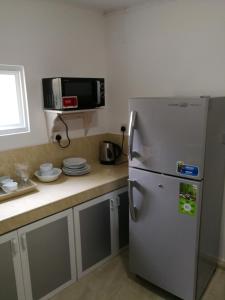 Kuchyň nebo kuchyňský kout v ubytování Holiday Home