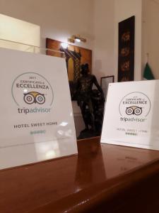 Certyfikat, podpis lub inny dokument wystawiony w obiekcie Hotel Sweet Home