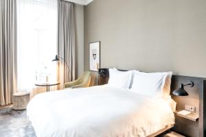 Postel nebo postele na pokoji v ubytování Pillows Grand Boutique Hotel Ter Borch Zwolle