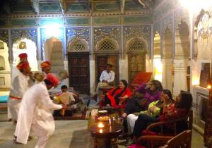 a group of people in a room with people sitting at Vedaaranya Haveli, Ramgarh- AM Hotel Kollection in Rāmgarh +37 photos