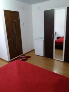 Postel nebo postele na pokoji v ubytování Vila Albatros