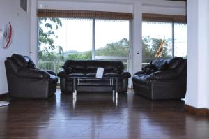 Posezení v ubytování Dew Lee Homestay & Farm House
