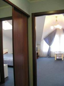 Postel nebo postele na pokoji v ubytování Hotel European