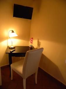 Μια τηλεόραση ή/και κέντρο ψυχαγωγίας στο B&B Residenza Umberto +29 φωτογραφίες