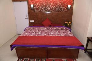 Ένα ή περισσότερα κρεβάτια σε δωμάτιο στο Prince Hotel Mallroad