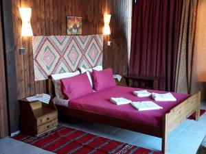 Postel nebo postele na pokoji v ubytování Hotel Mochlos
