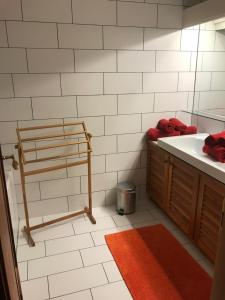 a bathroom with a sink and a towel rack at The Barts City Center - Self Check-in in Vienna +104 photos