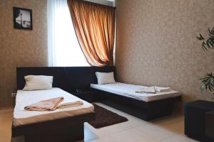 Postel nebo postele na pokoji v ubytování Hotel 8th Mile