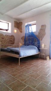 Posteľ alebo postele v izbe v ubytovaní Agriturismo Carincone