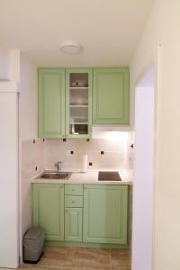 Kuchyňa alebo kuchynka v ubytovaní Luxury Licitar Heart Apartment