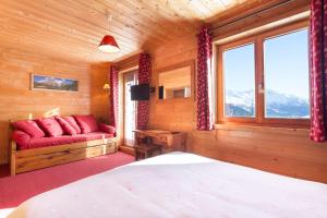 Postel nebo postele na pokoji v ubytování Hôtel L'Accroche Coeur
