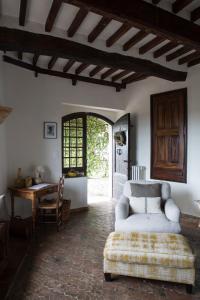 a living room with a couch and a table at La Miette in Vence