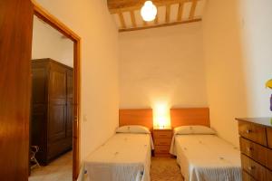 Postel nebo postele na pokoji v ubytování Apartamento en pleno Montseny Mas Romeu Turisme Rural