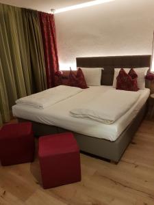 Ένα ή περισσότερα κρεβάτια σε δωμάτιο στο Hotel Kranebitt