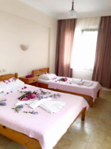 Postel nebo postele na pokoji v ubytování Star Hotel