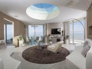 Телевизор и/или развлекательный центр в Hotel Waldorf- Premier Resort