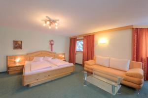 Rúm í herbergi á Hotel Olympia