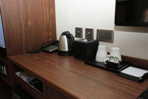 Tiện nghi pha trà/cà phê tại WE Hotel