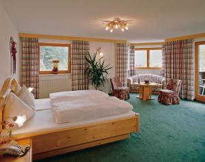 Rúm í herbergi á Hotel Olympia