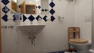 a bathroom with a sink and a toilet at Schloss Gmünd in Gmünd +32 photos