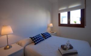 Posteľ alebo postele v izbe v ubytovaní Lets Holidays terrace apartment