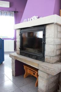 TV a/nebo společenská místnost v ubytování Apartment Nela