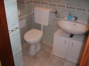 Koupelna v ubytování Apartment Porat + 15 fotografií
