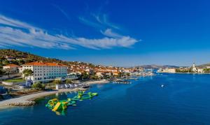 a river with a bunch of boats in the water at Apartment Patricia in Trogir
