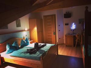 Postel nebo postele na pokoji v ubytování Agritur Bella di Bosco