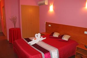 Cama o camas de una habitación en Guesthouse Monte Carlo