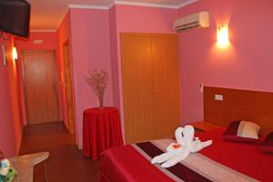 Cama o camas de una habitación en Guesthouse Monte Carlo