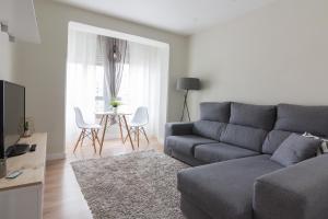 A seating area at Apartamento Avenida de Colón con Aire Acondicionado