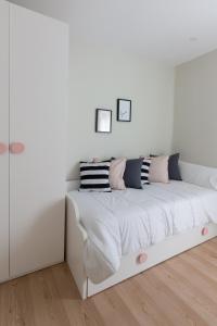 A bed or beds in a room at Apartamento Avenida de Colón con Aire Acondicionado