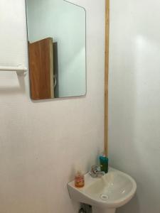 Un baño de Monte Campamento Hostel