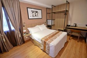 Postel nebo postele na pokoji v ubytování Diamond Inn