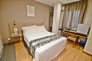 Postel nebo postele na pokoji v ubytování Diamond Inn