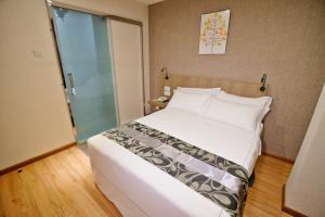 Postel nebo postele na pokoji v ubytování Diamond Inn