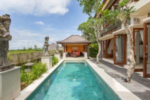 Πισίνα στο ή κοντά στο Villa Lidwina by Nagisa Bali