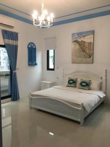 Ένα ή περισσότερα κρεβάτια σε δωμάτιο στο Canova Homestay
