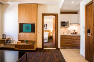 Η κουζίνα ή μικρή κουζίνα στο Citea Apart Hotel