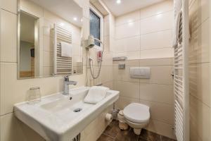 Koupelna v ubytování Hotel Windsor